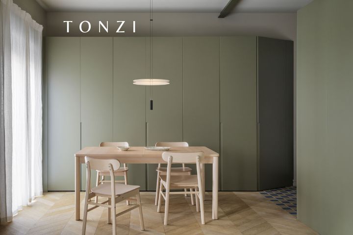 Lustre sobre mesa de jantar criando ambiente elegante com luz quente — Lustre para Sala de Jantar — Tonzi