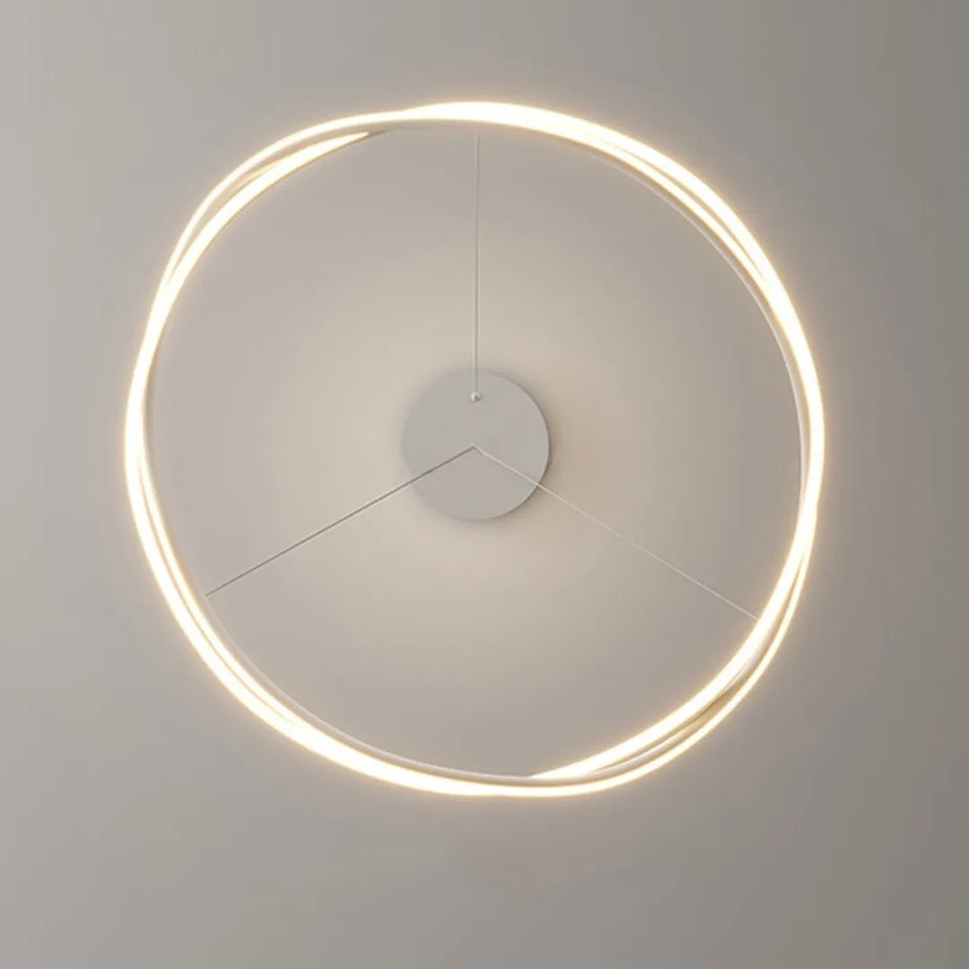 Close-up do anel LED aceso em branco quente visto de frente destacando a tira luminosa contínua — Luminária Pendente LED Anel Ajustável Moderno — Tonzi