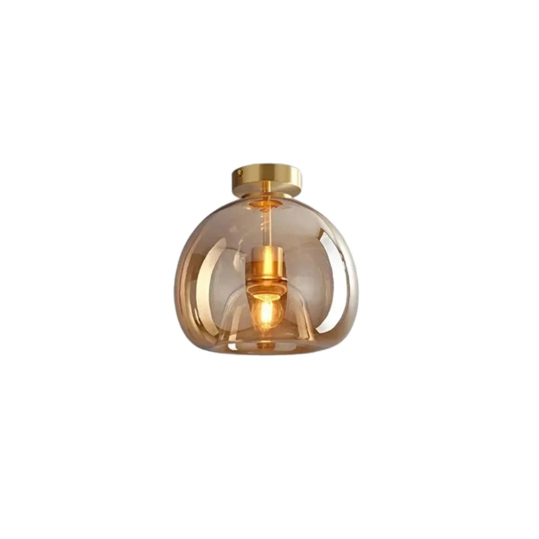 Plafon Hygge cognac aceso em teto de sala de estar com paleta neutra e sofá bege — Plafon Vidro Cognac Nórdico LED Minimalista Hygge — Tonzi